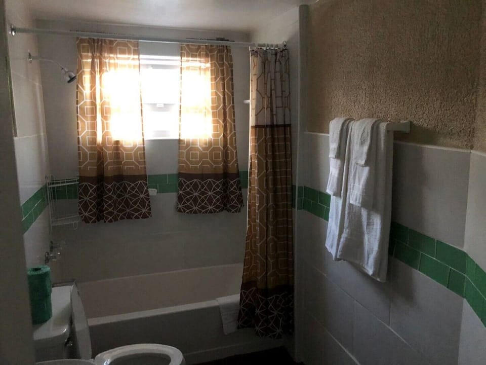 Full bathroom with tub/shower combo