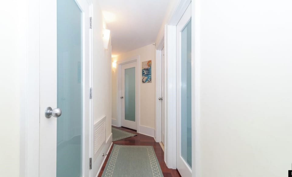 Custom frosted glass doors and hallway