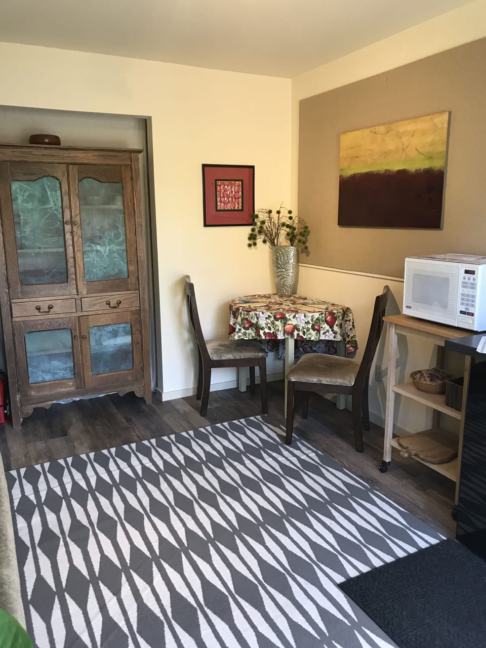 Living space with two person table. 