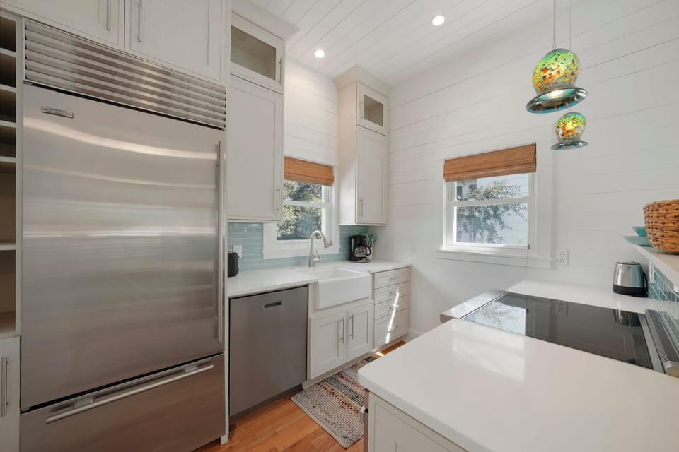 RENOVATED KITCHEN WITH QUARTZ COUNTERS & FARMHOUSE SINK