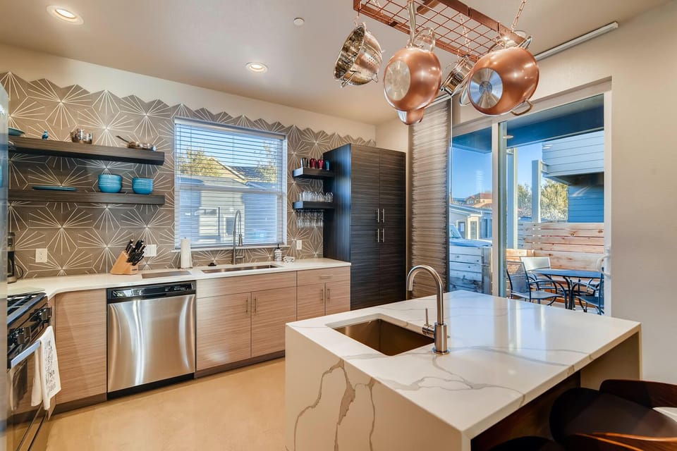 Kitchen with Walk-out Patio with BBQ Grill