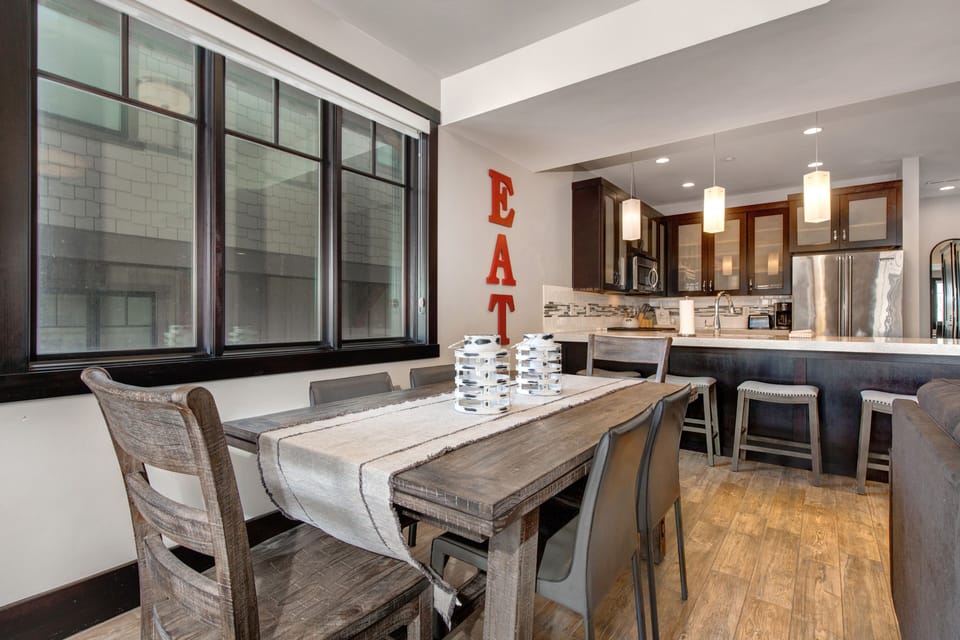 Dining Area with seating for six and private patio access