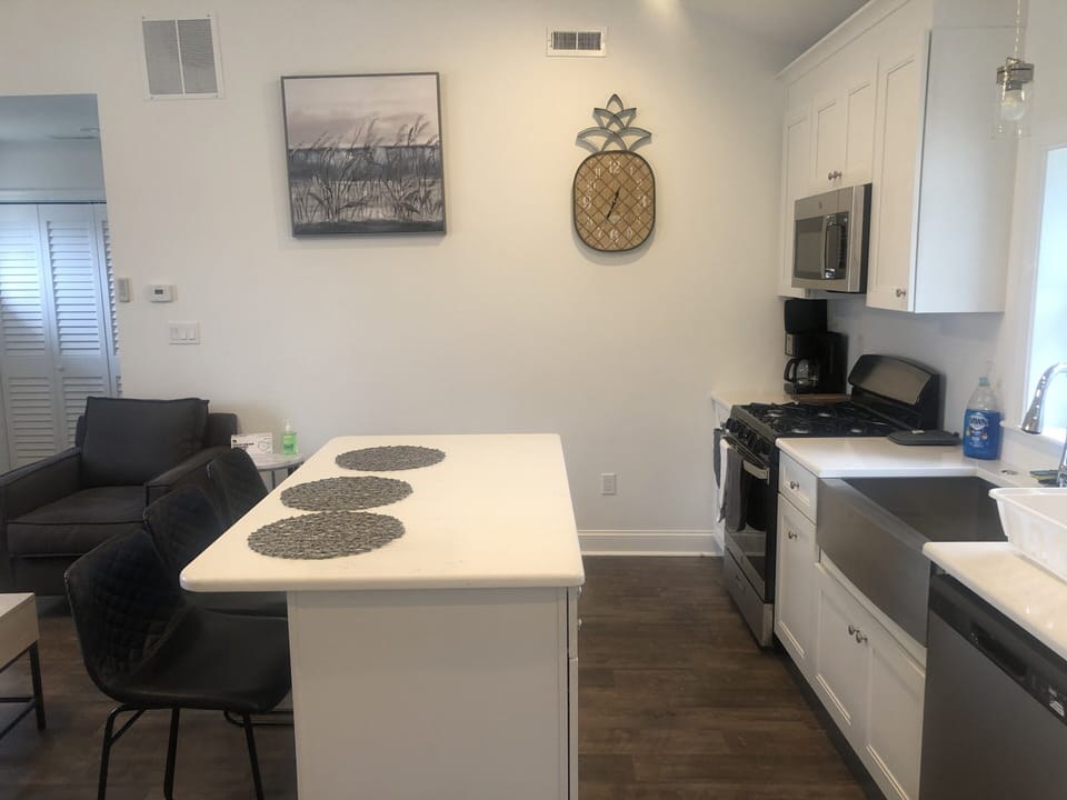New kitchen ...that includes oven, microwave, farmers sink and dishwasher