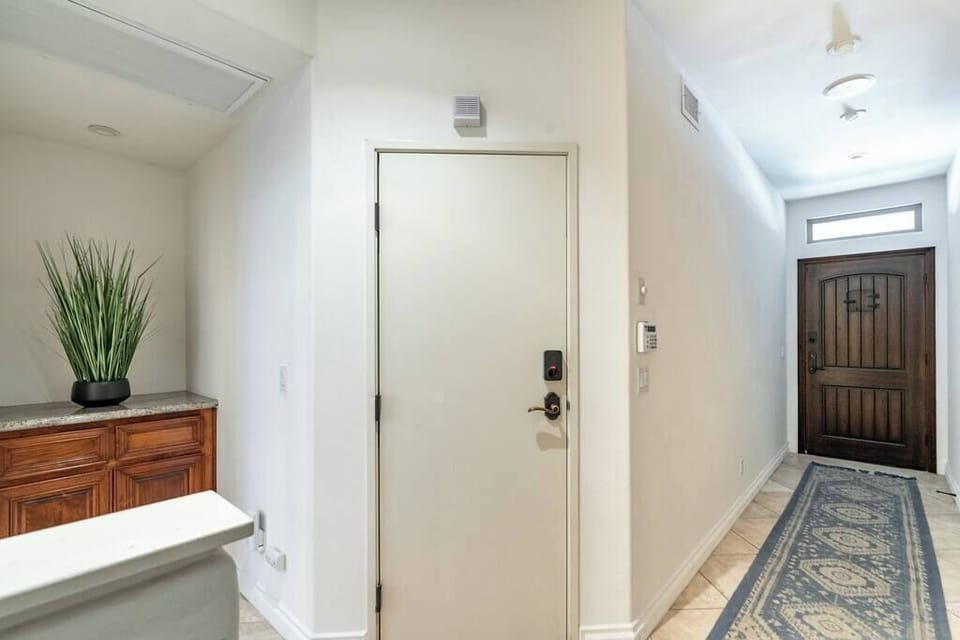 Front door corridor | Access to the Two-Car Garage.