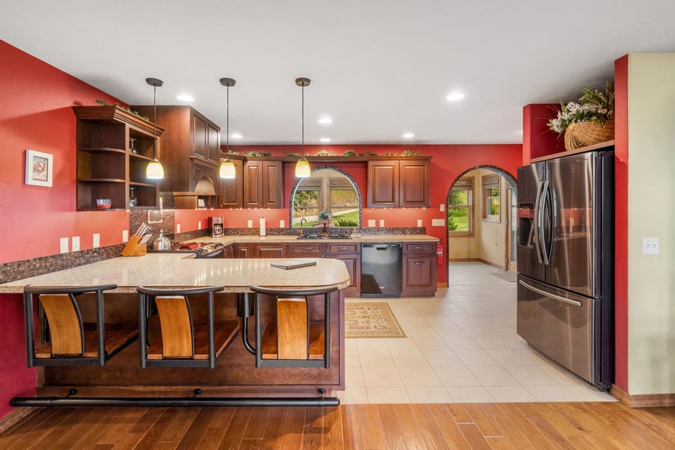 Full kitchen available with drip coffee maker. Seat 3 guests at the kitchen island.