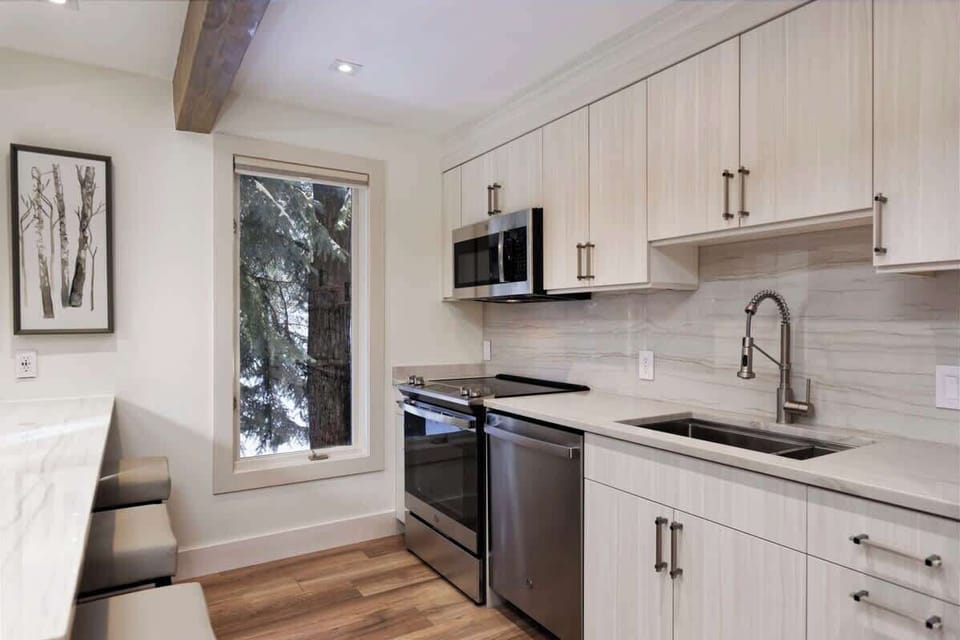 New kitchen with stainless appliances