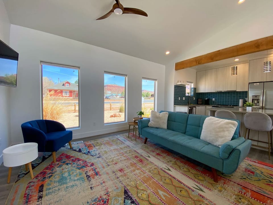 Light-filled living. The seamless living and dining areas are bathed in natural light thanks to expansive windows.