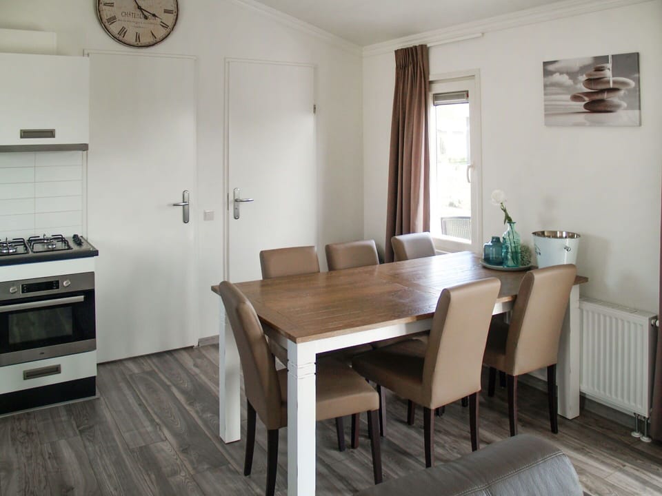 Table, Furniture, Property, Chair, Window, Wood, Lighting, Interior Design, Gas Stove, Clock