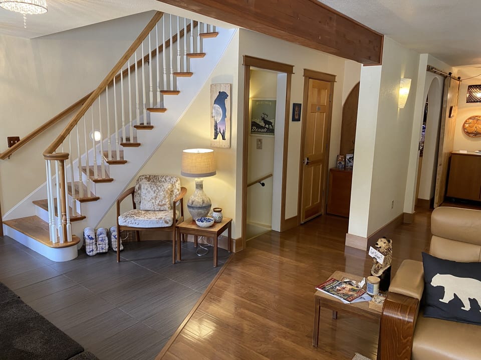 Staircases to second and bottom floors / Main Lobby Washroom