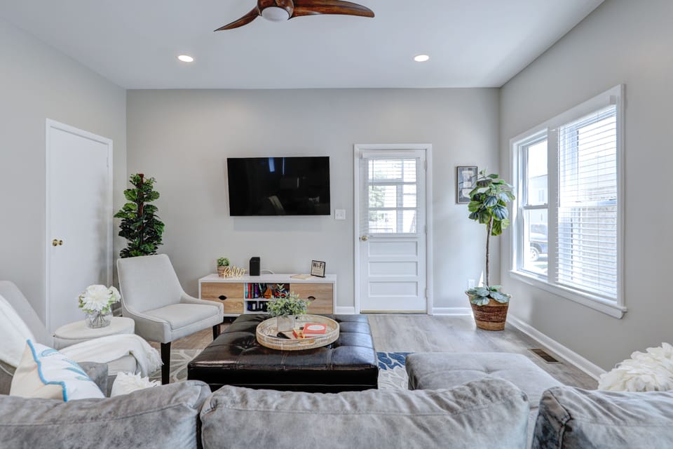 Family room with a large flat screen smart TV