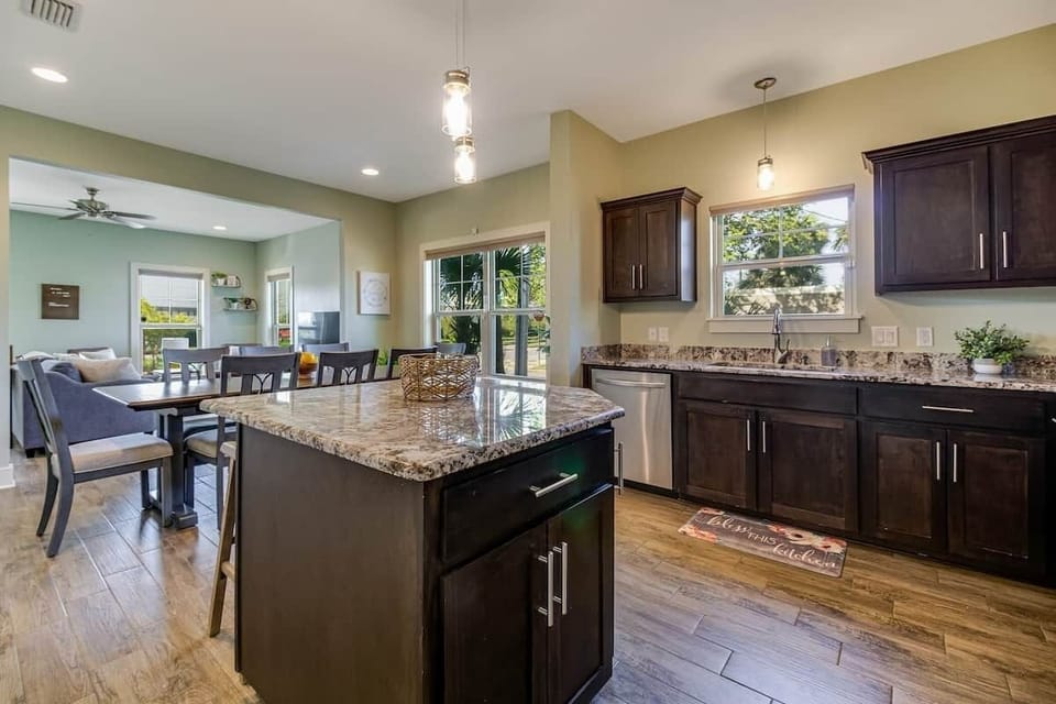 Fully equipped kitchen and dining space for group meals. Enjoy convenience in Downtown Pensacola.