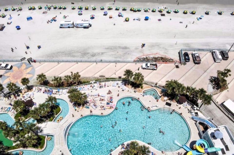balcony view of pool and beach