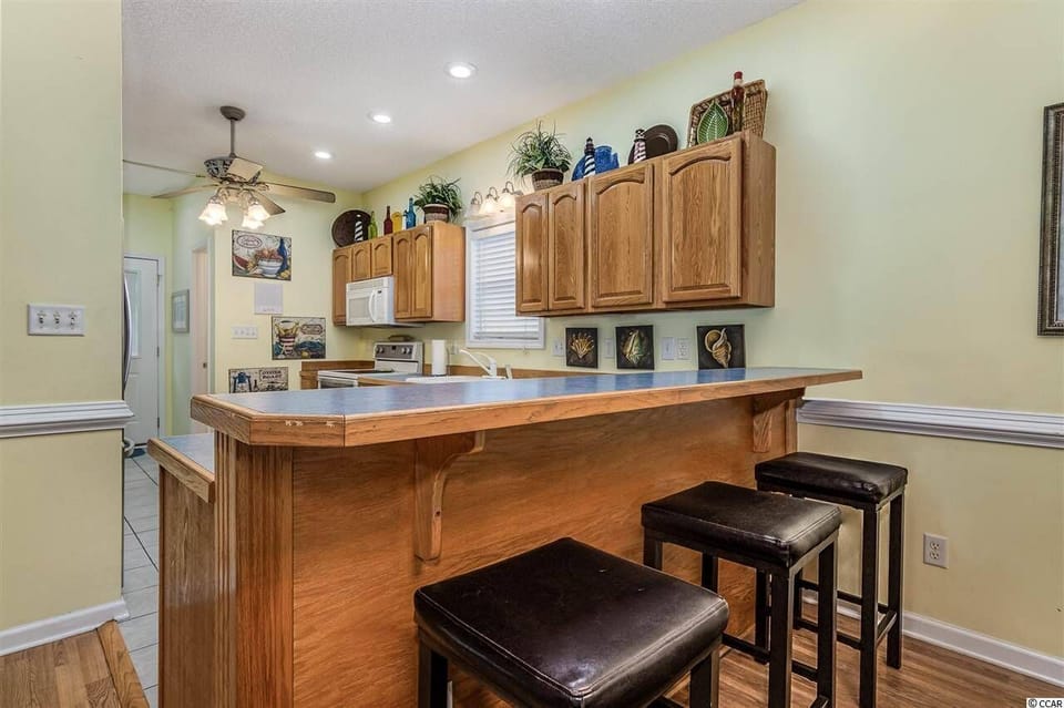 What a kitchen!  It's fully stocked with dishes, pots, pans, oven, DW, etc.