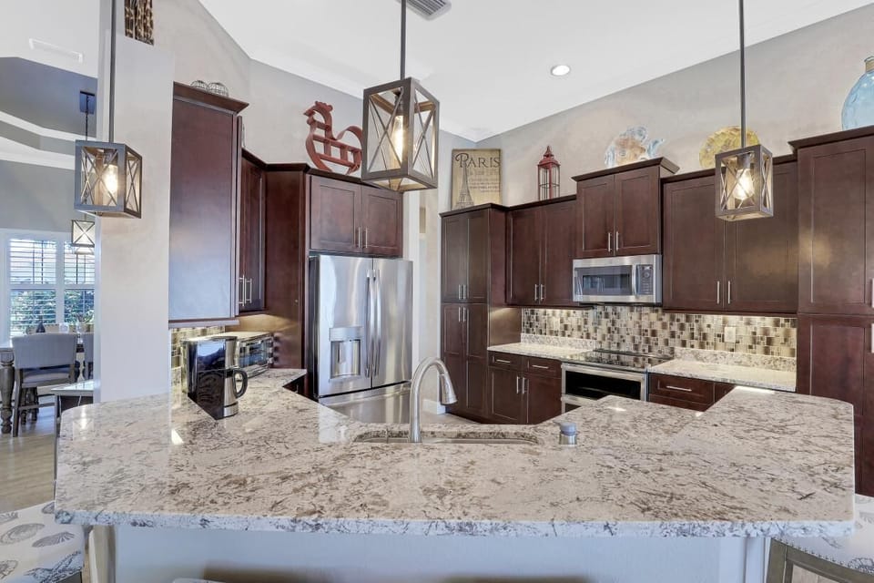 The spacious and stylish Kitchen is open plan