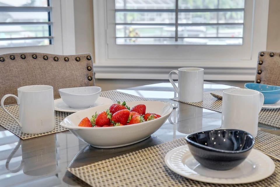 The casual Dining Area overlooks the pool deck