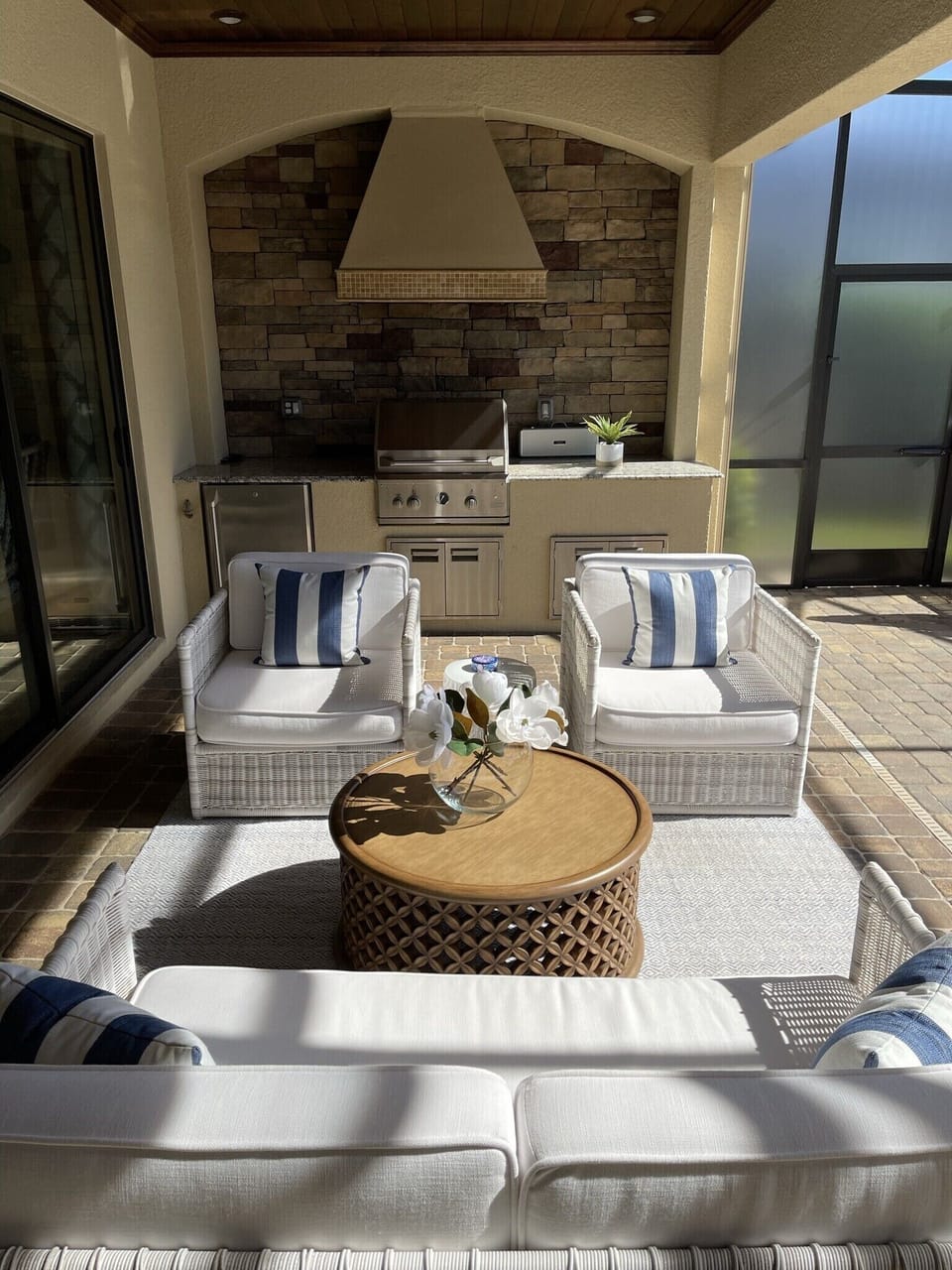 Outside grill and covered living space for entertaining 