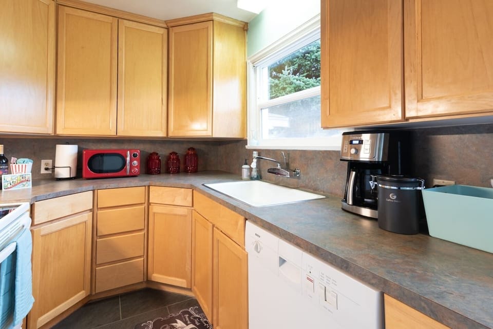 Cute, well-outfitted kitchen.