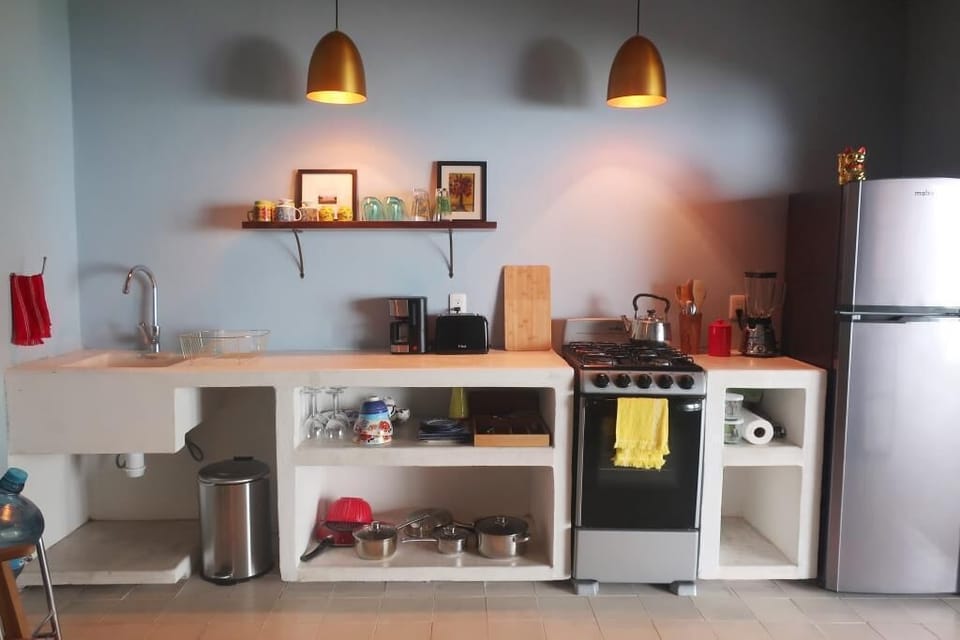 Kitchen with toaster, blender, coffee maker...