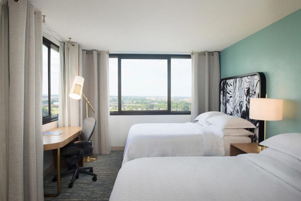 Relax with plenty of space, light, and comfortable bedding.