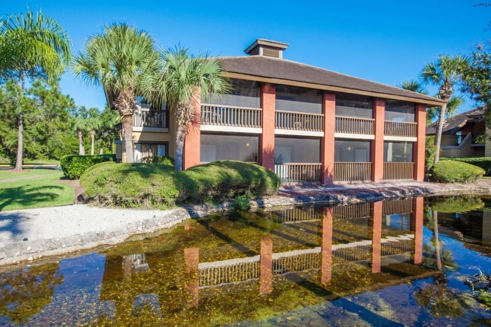 Wake to tranquil pond views and classic resort architecture.