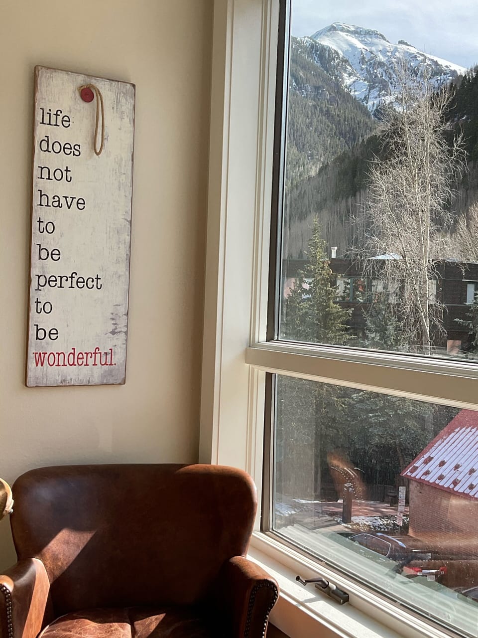 Sunny reading nook with leather chairs and wonderful views including the gondola