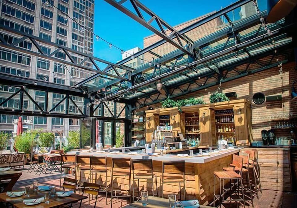 Gather at the rooftop bar for sunset cocktails and chatter.