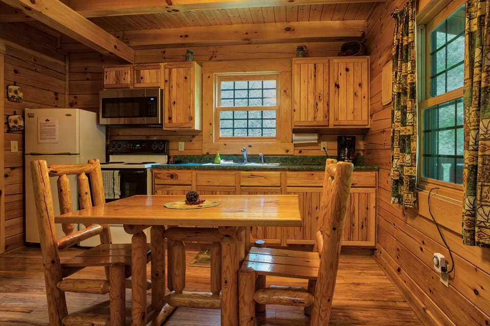 This inviting retreat includes an open-concept area with a fully equipped eat-in kitchen.