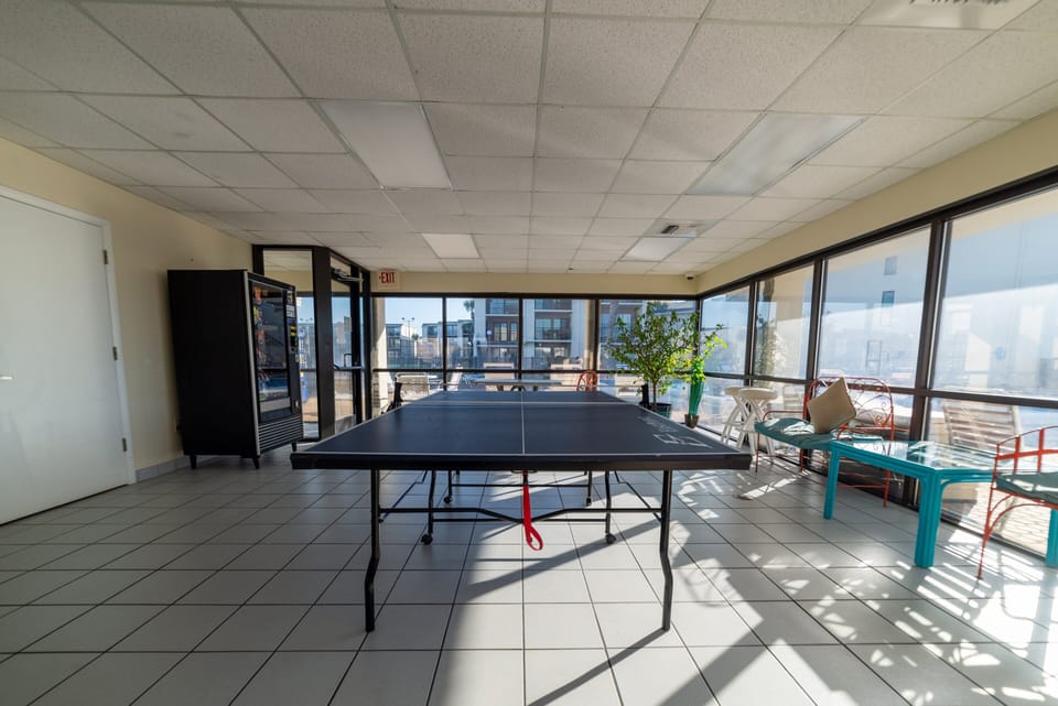 Ping pong and vending machines located inside the club house