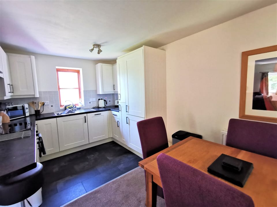 There's a well equipped kitchen / diner with dishwasher and fridge freezer.