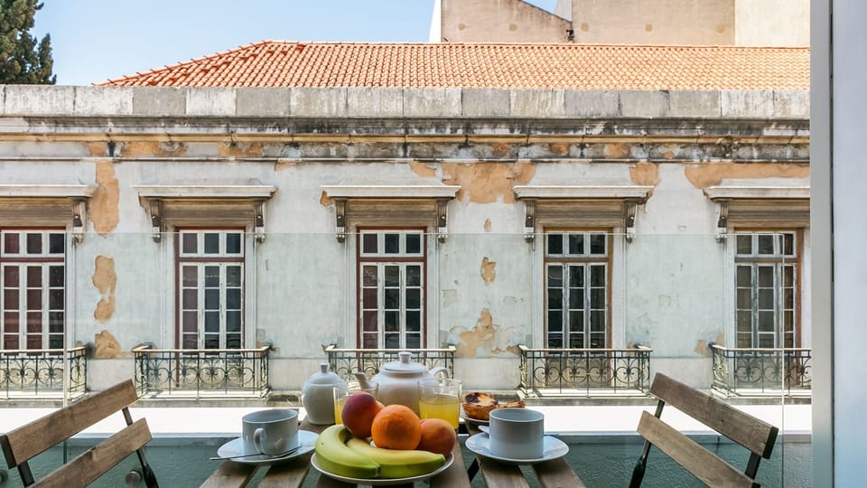 Enjoy a morning coffee or evening drinks, while taking in Lisbon's sun and breeze in the balcony #sunny #breeze #portugal #pt #lisbon