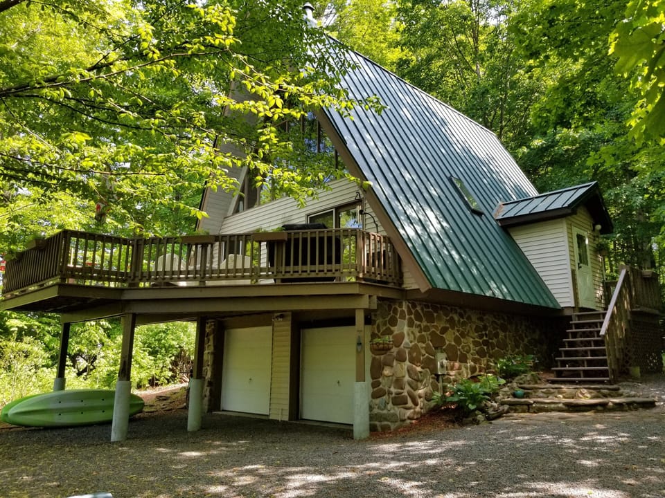 The cottage faces north and looks out upon Lake Ontario.