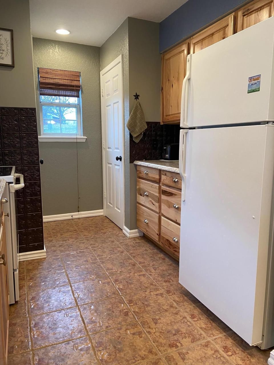 closet with cleaning supplies