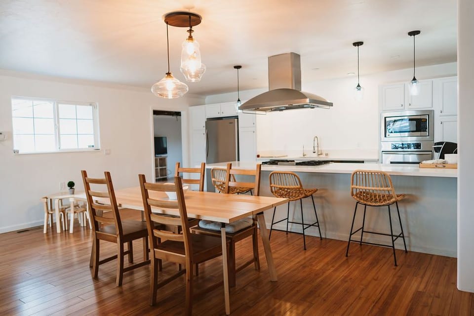Open kitchen layout into dining and living room area. 