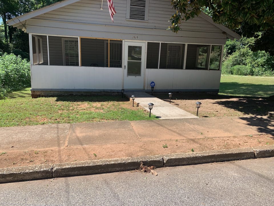 Front Yard And Screened in Porch 
