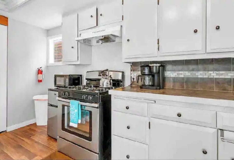 full kitchen w all essentials needed for cooking