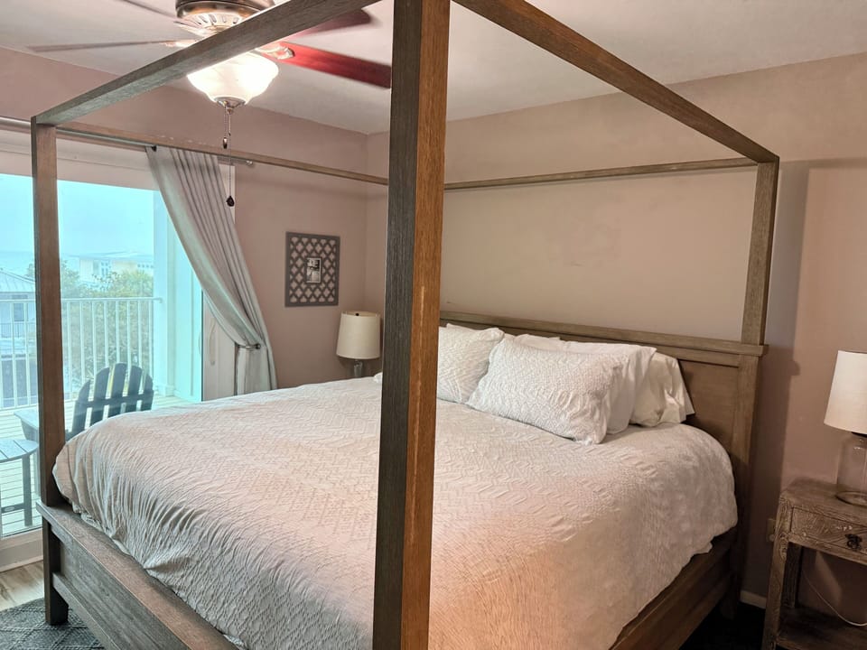 3rd floor primary bedroom with balcony & private bathroom 