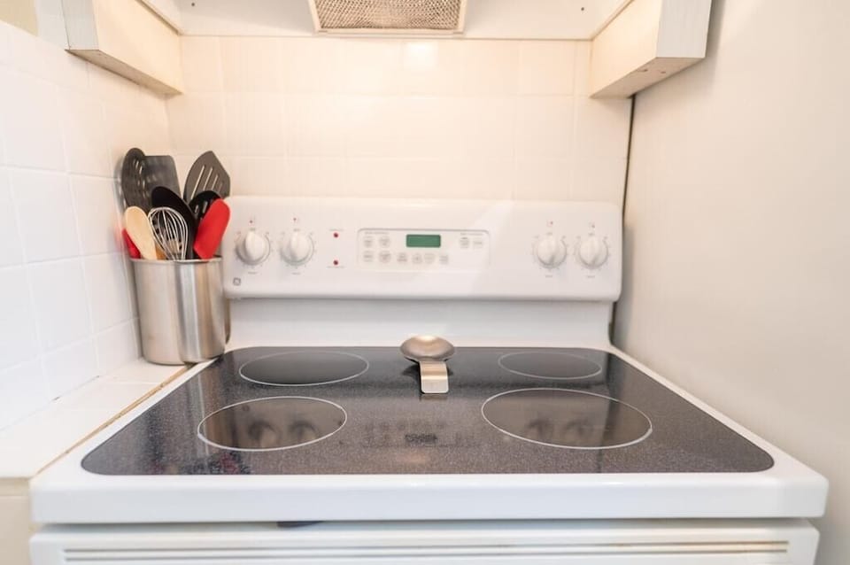 Full size electric glass-top stove and oven for all our guests that like to cook