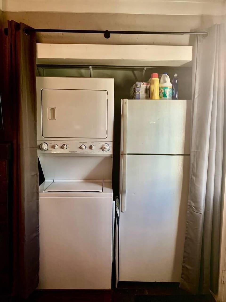 Stacked washer and dryer with full sized fridge