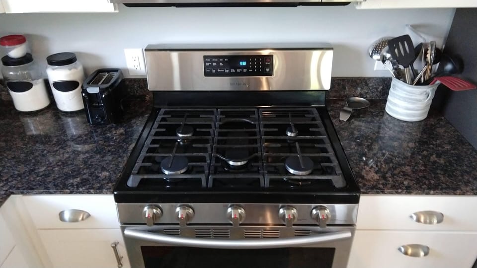 Gas range and granite counters