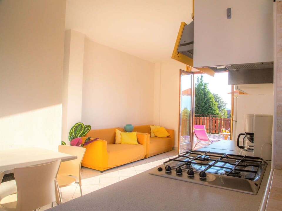 Property, Furniture, Orange, Comfort, Interior Design, Living Room, Flooring, Floor, Wood, Wall