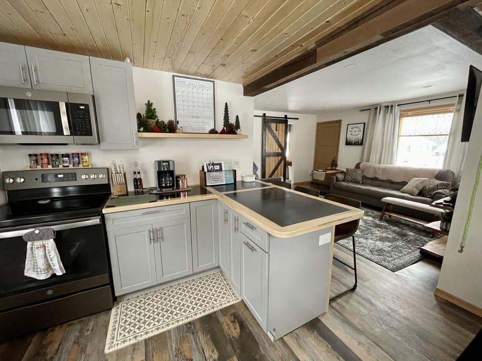 Kitchen looking into living room.