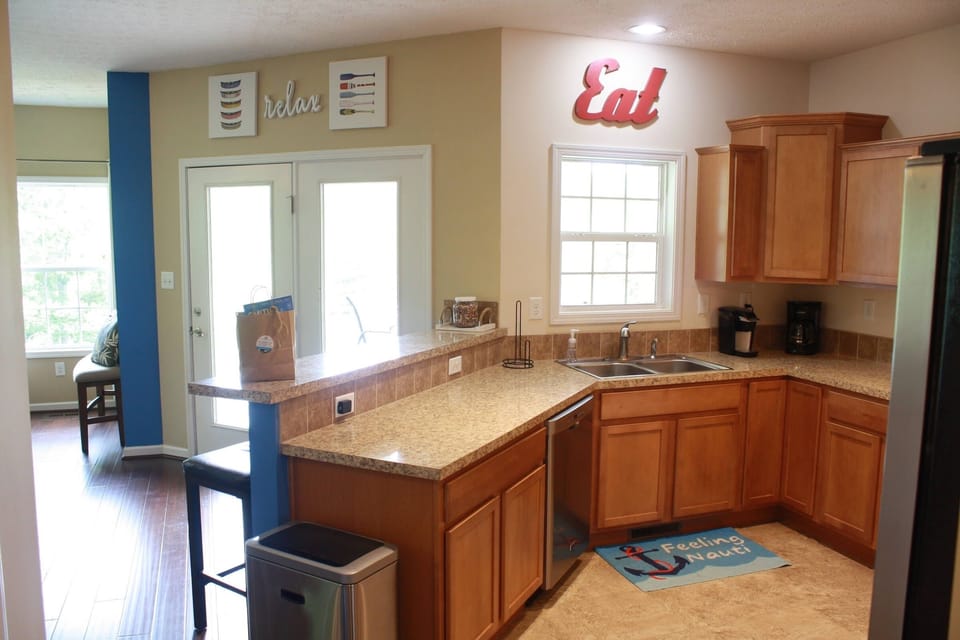 Kitchen w/ bar seating for 3