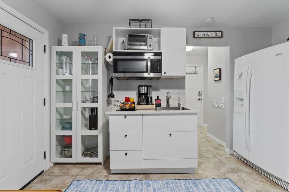 Kitchenette with many modern appliances for your cooking needs