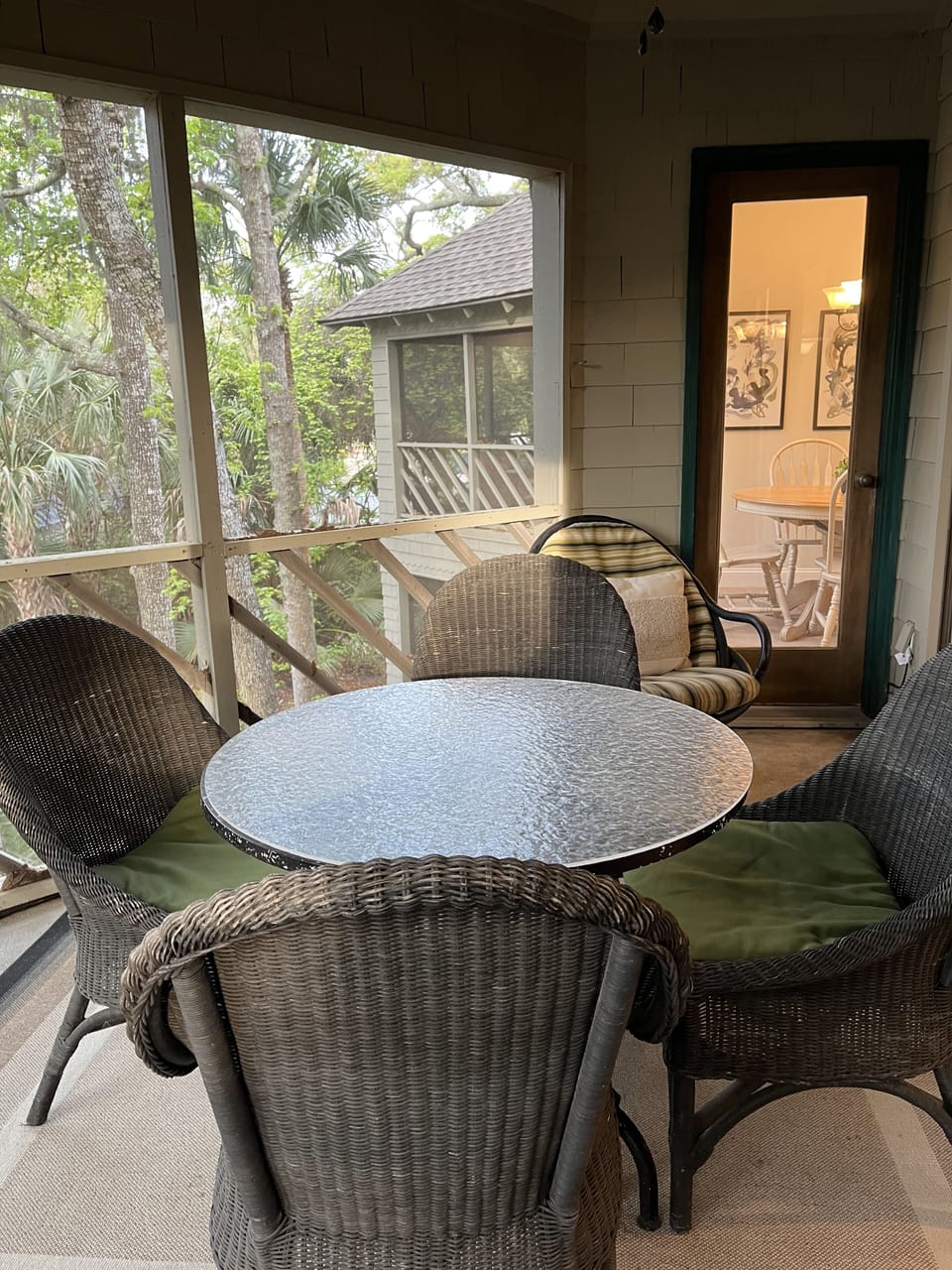 Outdoor dining on private screen porch 