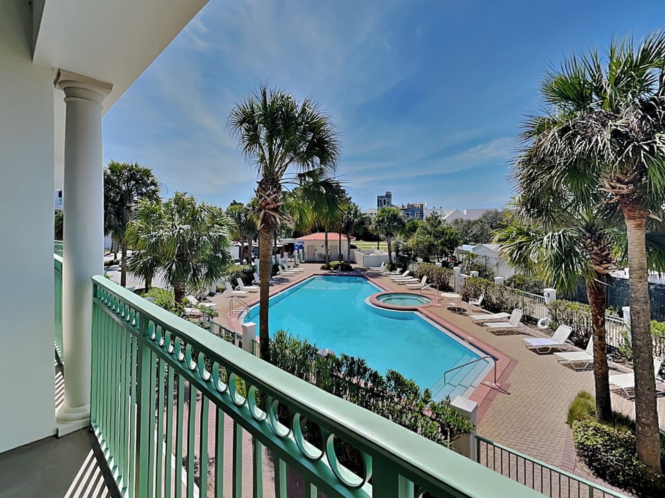 Furnished Balcony - Lush Tropical Pool Views