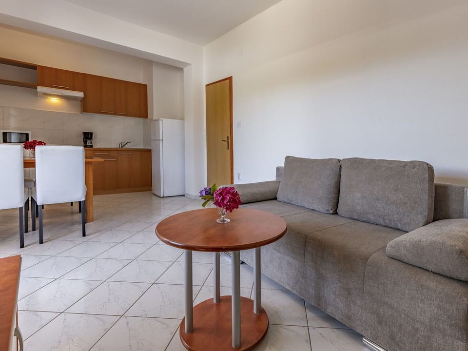 Furniture, Property, Table, Couch, Interior Design, House, Flooring, Wood, Floor, Line