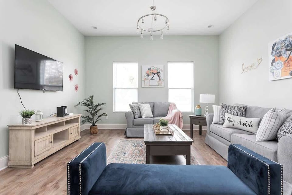 Our beautiful, spacious living room, complete with comfy furniture and HDTV, is the perfect place to gather and unwind!