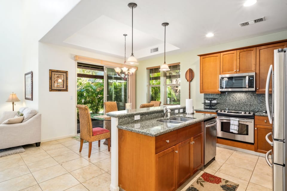Open layout of kitchen and dining room with amazing natural ligh
