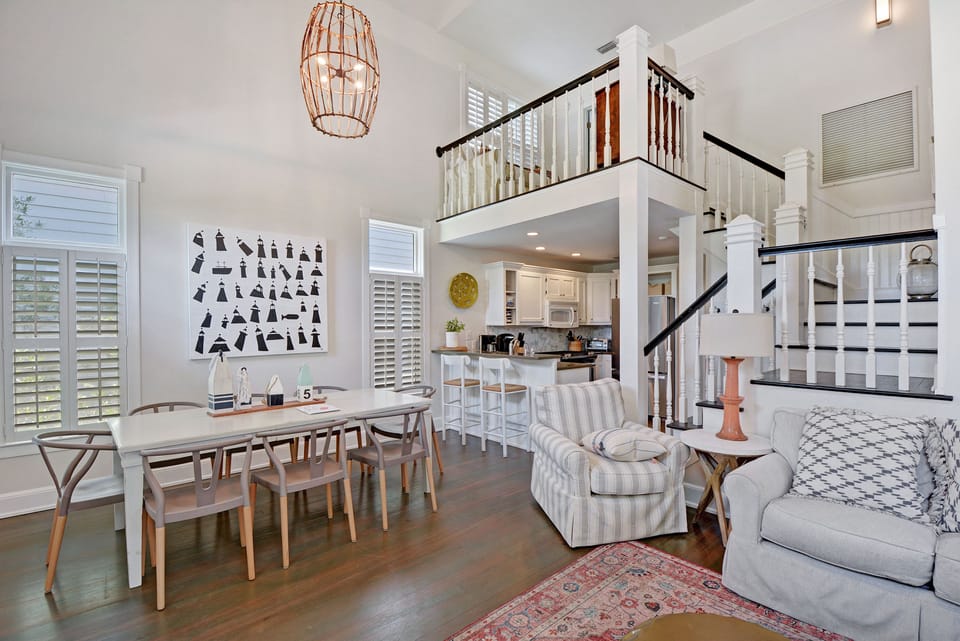 Open Kitchen, Dining, and Living Area - Dining table seats six beside the kitchen and living room, keeping meals and downtime in one connected space.