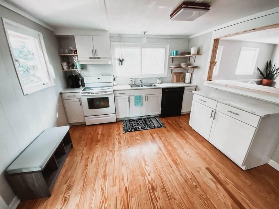 The full kitchen with a refrigerator not pictured.